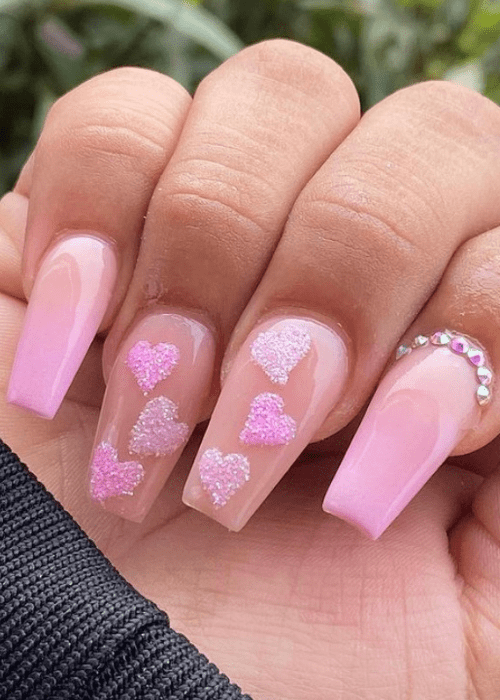 Beautiful Valentine’s day nail designs that you will want to try for yourself this year. #valentinesdaynails #valentinesdaynailsacrylic #nails #beauty #valentinesdaynailsacryliclong