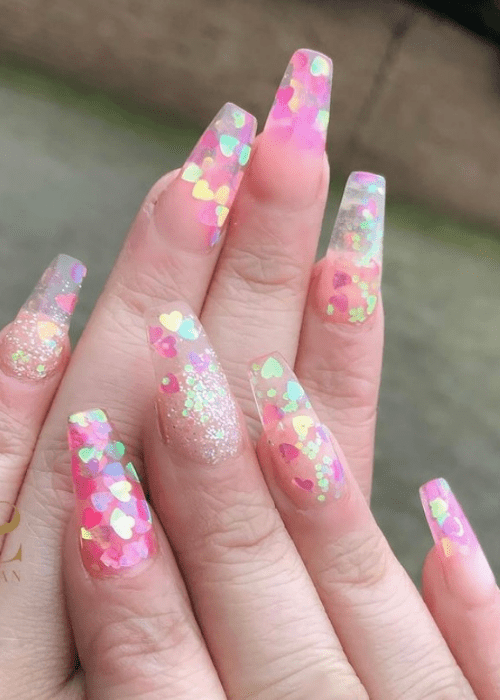 Beautiful Valentine’s day nail designs that you will want to try for yourself this year. #valentinesdaynails #valentinesdaynailsacrylic #nails #beauty #valentinesdaynailsacryliclong