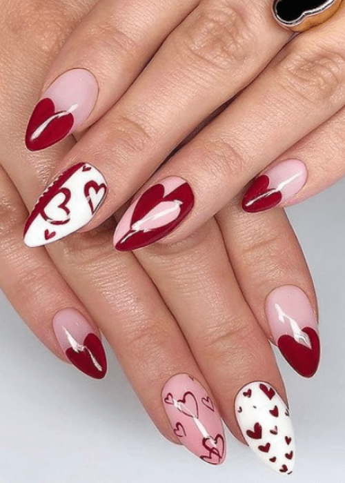 Beautiful Valentine’s day nail designs that you will want to try for yourself this year. #valentinesdaynails #valentinesdaynailsacrylic #nails #beauty #valentinesdaynailsacryliclong