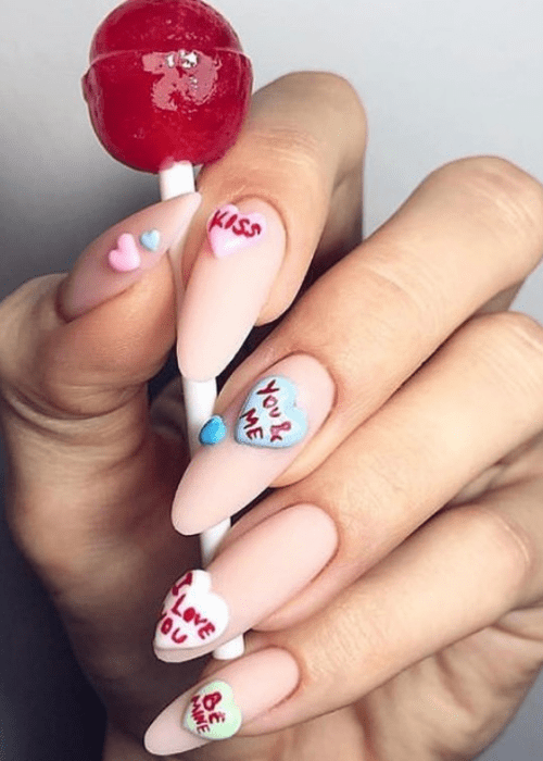 Beautiful Valentine’s day nail designs that you will want to try for yourself this year. #valentinesdaynails #valentinesdaynailsacrylic #nails #beauty #valentinesdaynailsacryliclong