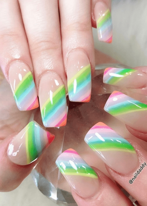 a shiny rainbow nail design