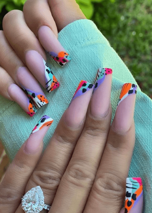 mixed up animal pattern french tips