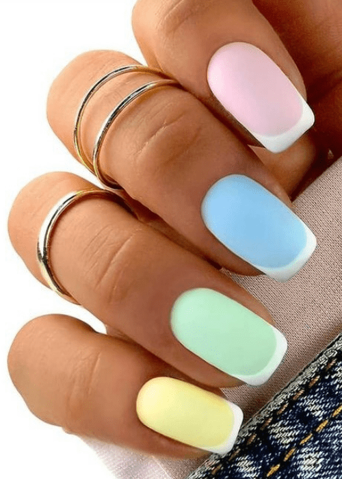 multicolored nails with a white french tip