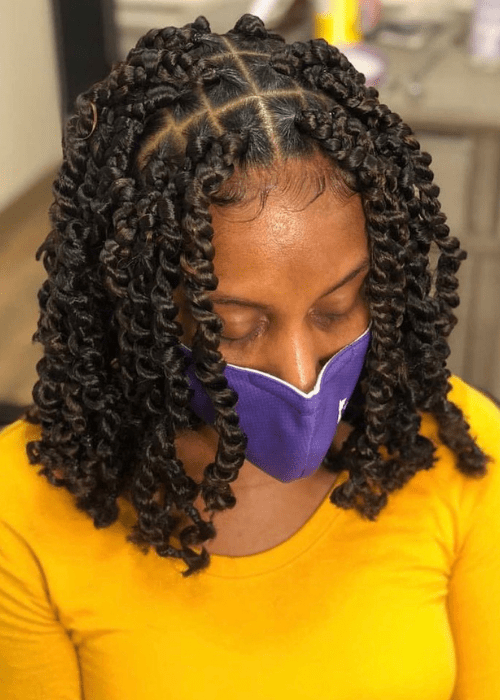 A short braid hairstyle with passion twists