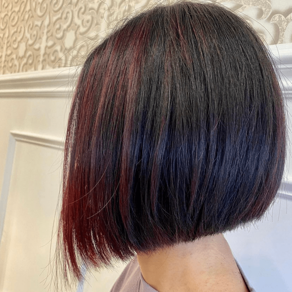 An asymmetrical bob with red color